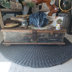 Low profile teak chest used as a coffee table – handcrafted solid wood piece